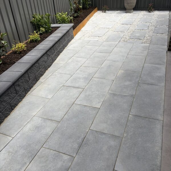 Coastal Stone 800 Steel Paving | Versawall with bullnose Garden Wall Charcoal | Rosewall Landscaping